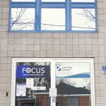 The front of one of the Focus offices, in a grey office building.